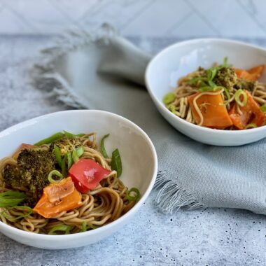 Image of two bowls with ramen noodles and veggies
