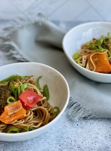 Image of two bowls with ramen noodles and veggies