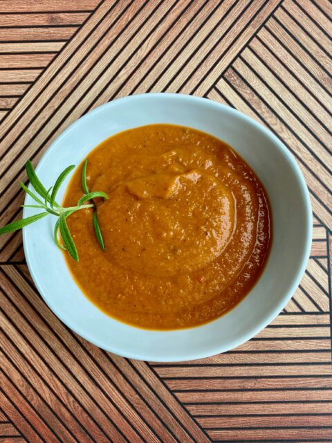 An image of a bowl full of tomato soup