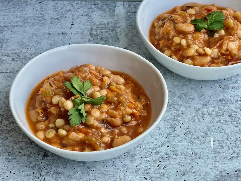 A bowl of tomato couscous soup