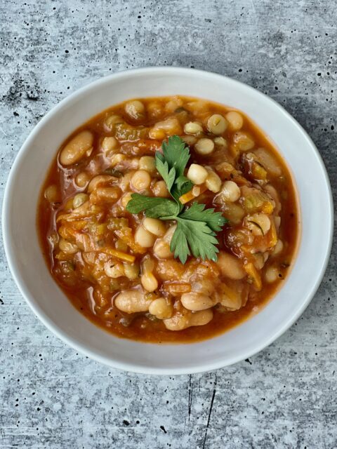 A bowl of tomato couscous soup